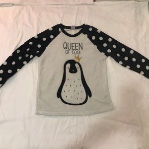 A pajama top in Good condition.